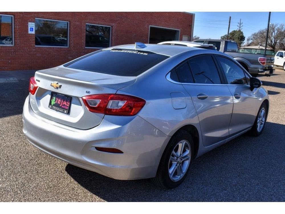 2017 SILVER /BLACK Chevrolet Cruze 4dr Sdn 1.4L LT w/1SD (1G1BE5SM0H7) with an ENGINE, 1.4L TURBO DOHC 4-CYLINDER DI engine, 6-SPEED AUTOMATIC transmission, located at 3701 Avenue Q, Lubbock, 79412, (806) 762-3556, 33.560417, -101.855019 - Photo #2