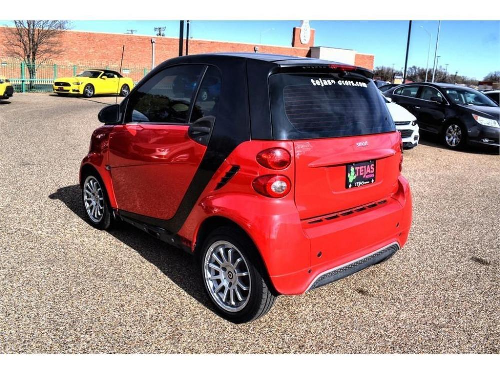 2013 RED /BLACK Smart fortwo pure (WMEEJ3BA7DK) with an 1.0L MPFI 12-valve I3 engine engine, 5-SPEED AUTOMATIC transmission, located at 3701 Avenue Q, Lubbock, 79412, (806) 762-3556, 33.560417, -101.855019 - Photo #2