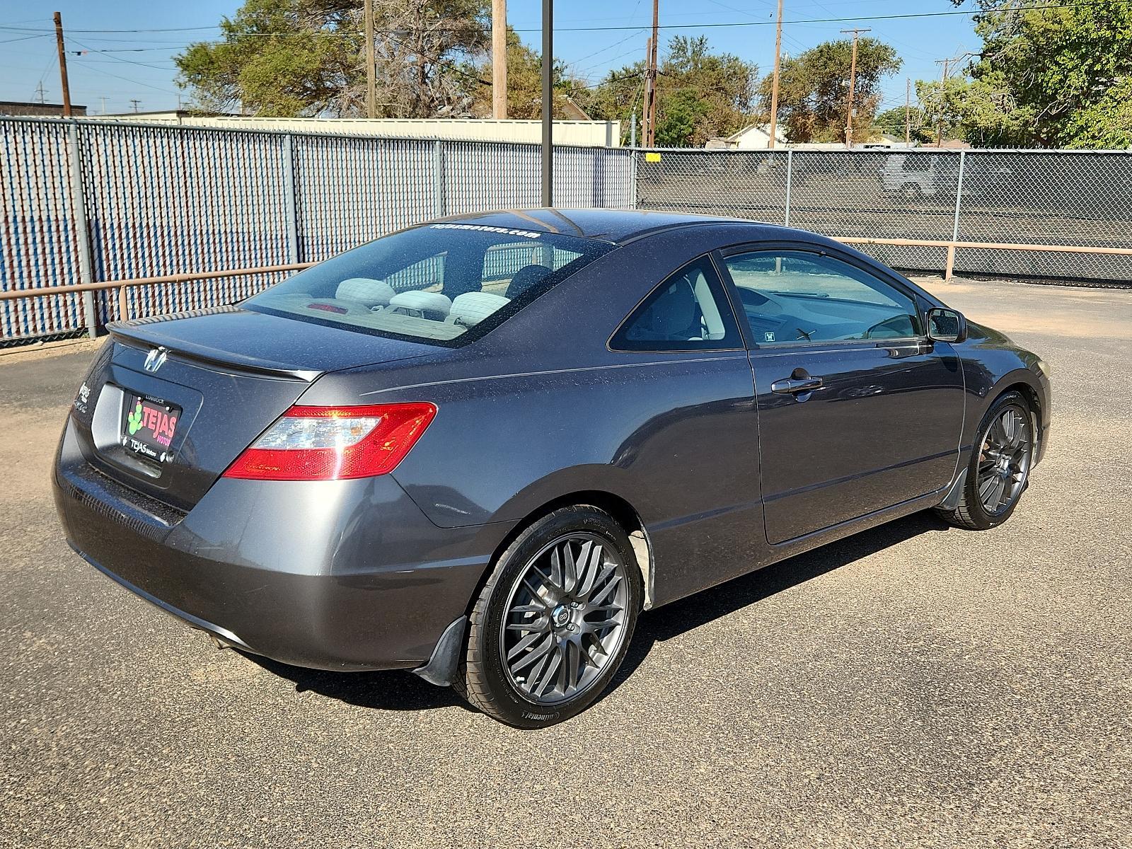 2011 Polished Metal Metallic - GY /Gray - GR Honda Civic Cpe LX (2HGFG1B6XBH) with an 1.8L SOHC MPFI 16-valve i-VTEC I4 engine engine, located at 4110 Avenue Q, Lubbock, 79412, 33.556553, -101.855820 - 09/05/2023 INPSECTION IN ENVELOPE GOD 09/26/1963 KEY IN ENVELOPE GOD - Photo #1