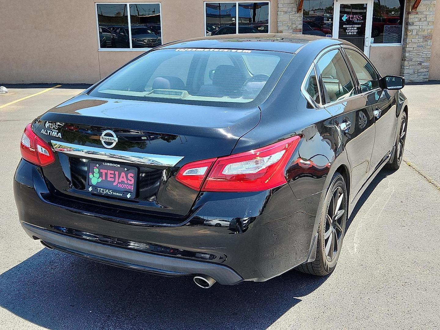 2016 Super Black Nissan Altima 2.5 S (1N4AL3AP0GC) with an 2.5L I-4 DOHC, variable valve control, regular unleaded, engine with 182HP engine, located at 4110 Avenue Q, Lubbock, 79412, 33.556553, -101.855820 - Photo#1