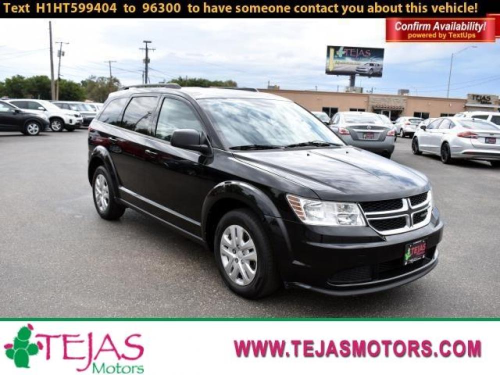 2017 PITCH BLACK CLEARCOAT /BLACK Dodge Journey SE FWD (3C4PDCAB9HT) with an 2.4L I4 DOHC 16V Dual VVT engine, 4-SPEED AUTOMATIC VLP transmission, located at 3701 Avenue Q, Lubbock, 79412, (806) 762-3556, 33.560417, -101.855019 - Photo #0