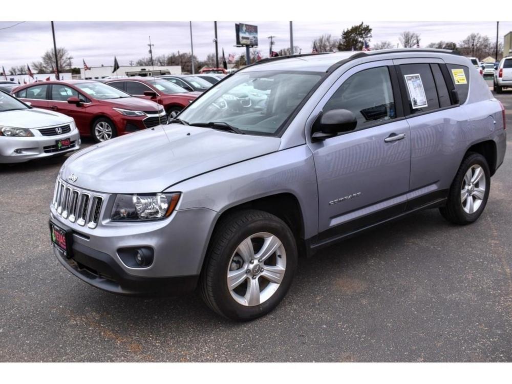 2016 BILLET SILVER METALLIC CLEARCOAT /DARK SLATE GRAY Jeep Compass 4WD 4dr Sport (1C4NJDBB4GD) with an 2.4L I4 DOHC 16V Dual VVT engine, AUTOMATIC transmission, located at 3701 Avenue Q, Lubbock, 79412, 33.560417, -101.855019 - Photo #1