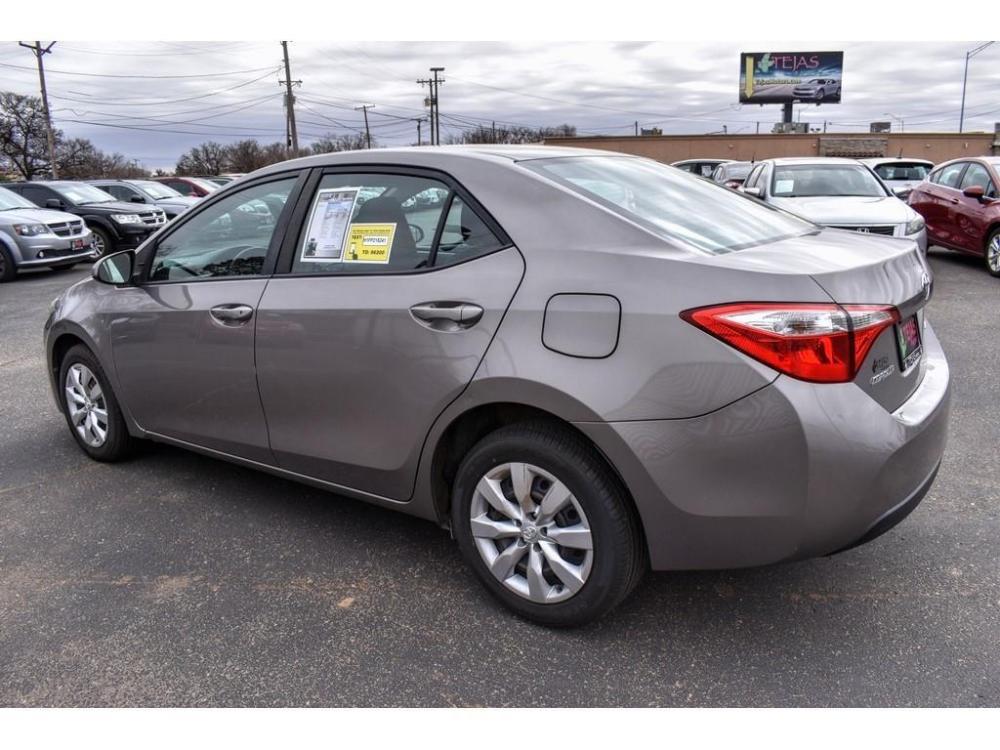 2015 CLASSIC SILVER METALLIC /AMBER Toyota Corolla 4dr Sdn CVT LE (Natl) (5YFBURHE3FP) with an Engine: 1.8L I-4 DOHC Dual VVT-i engine, 4-SPEED AUTOMATIC W/ECT-I transmission, located at 3701 Avenue Q, Lubbock, 79412, 33.560417, -101.855019 - Photo #2