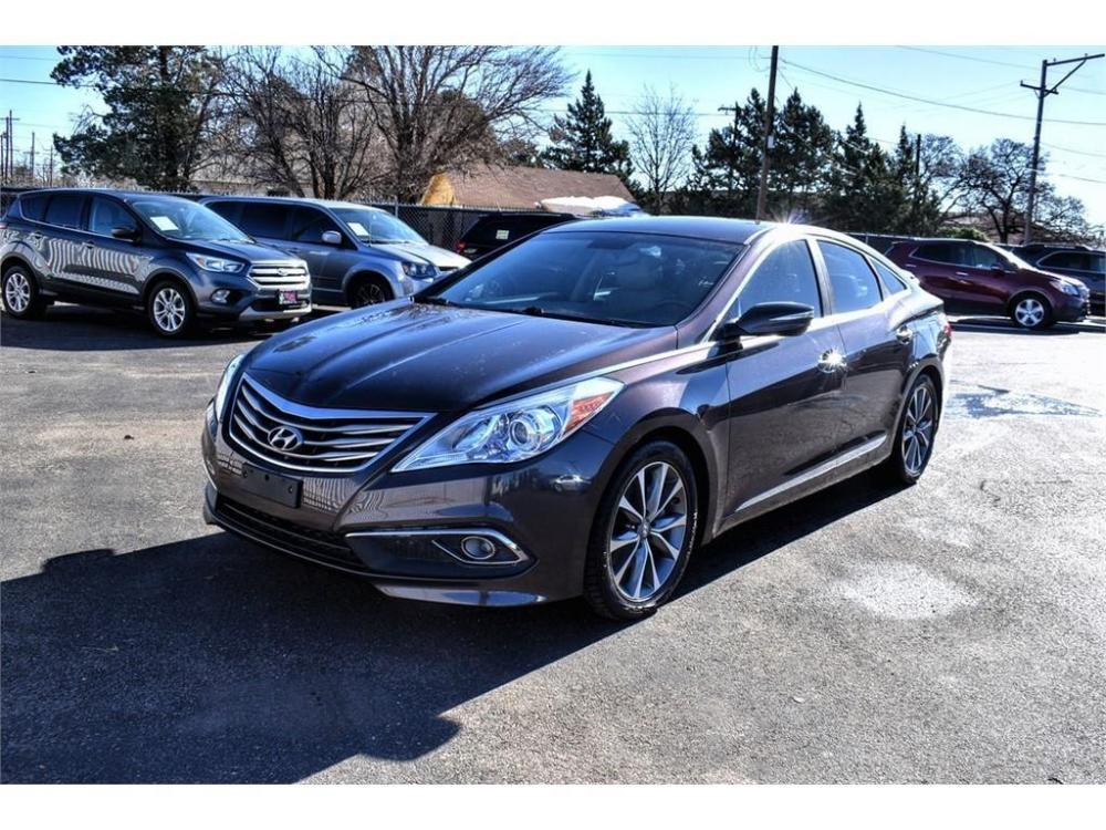 2015 GRAY /BROWN Hyundai Azera (KMHFG4JGXFA) with an Engine: 3.3L GDI DOHC 24-Valve V6 engine, 6-SPEED AUTOMATIC transmission, located at 3701 Avenue Q, Lubbock, 79412, (806) 762-3556, 33.560417, -101.855019 - Photo #3