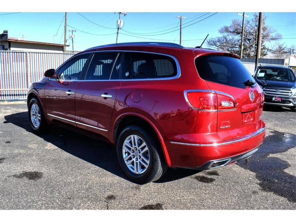 2014 CRYSTAL RED TINTCOAT /GRAY Buick Enclave (5GAKRAKD8EJ) with an 3.6L V6 DOHC 24V engine, 6-SPEED AUTOMATIC OVERDRIVE transmission, located at 3701 Avenue Q, Lubbock, 79412, (806) 762-3556, 33.560417, -101.855019 - Photo #2