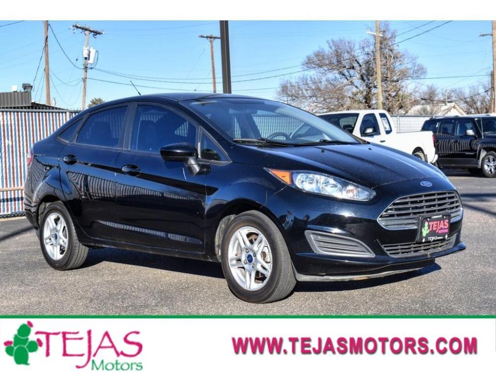 2018 BLACK /BLACK Ford Fiesta (3FADP4BJ2JM) with an 1.6L L4 DOHC 16V engine, located at 3701 Avenue Q, Lubbock, 79412, 33.560417, -101.855019 - Photo #0