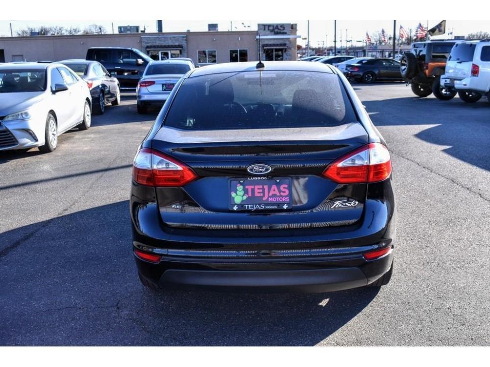 2018 BLACK /BLACK Ford Fiesta (3FADP4BJ2JM) with an 1.6L L4 DOHC 16V engine, located at 3701 Avenue Q, Lubbock, 79412, 33.560417, -101.855019 - Photo #2