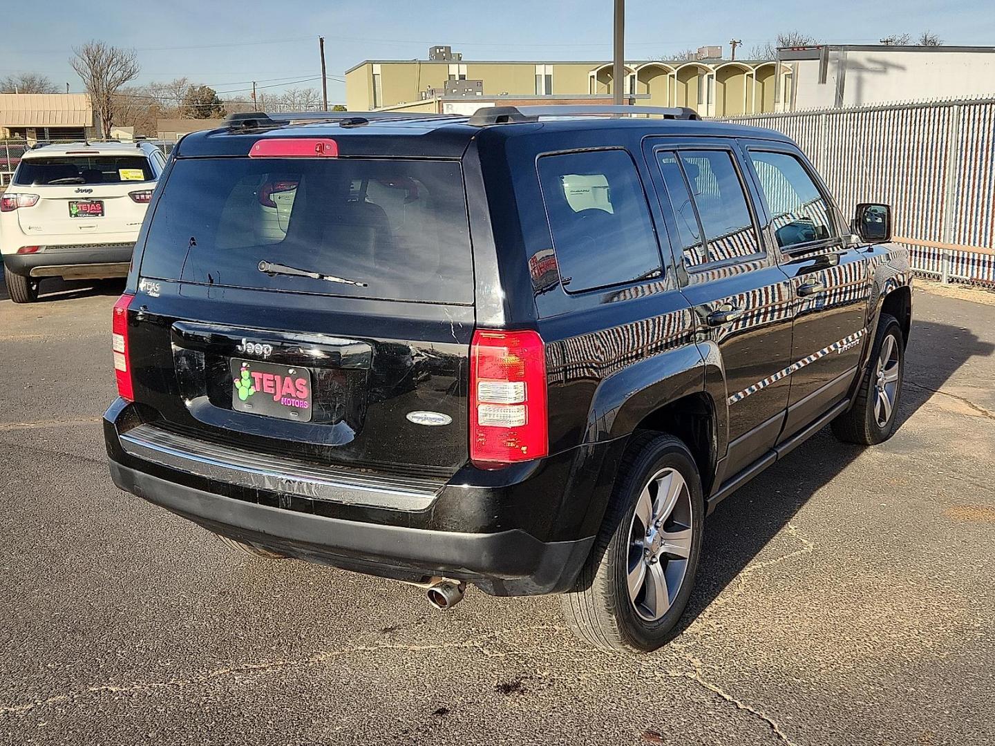 2017 Black Clearcoat - PX8 /Dark Slate Gray - DV Jeep Patriot High Altitude FWD (1C4NJPFA7HD) with an 2L I-4 DOHC, variable valve control, regular unleaded, engine with 158HP engine, located at 4110 Avenue Q, Lubbock, 79412, 33.556553, -101.855820 - Photo#2