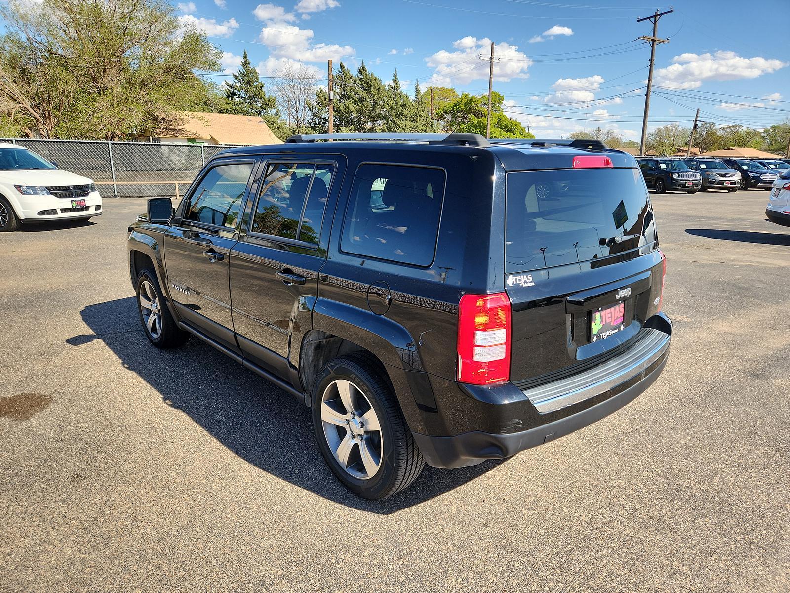2017 Black Clearcoat /Dark Slate Gray Jeep Patriot High Altitude (1C4NJPFA7HD) with an ENGINE: 2.0L I4 DOHC 16V DUAL VVT engine, located at 4110 Avenue Q, Lubbock, 79412, 33.556553, -101.855820 - Photo #2