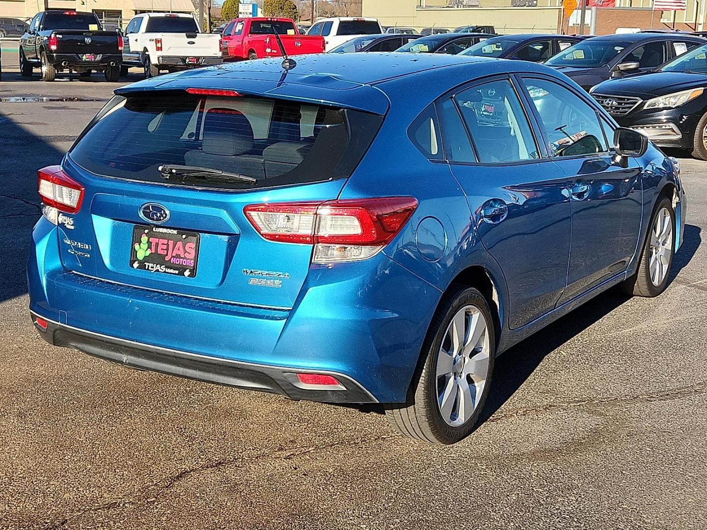 2017 BLUE Subaru Impreza 2.0i (4S3GTAA65H3) with an 2L H-4 gasoline direct injection, DOHC, variable valve control, regular unleaded, engine with 152HP engine, located at 4110 Avenue Q, Lubbock, 79412, 33.556553, -101.855820 - Photo#1