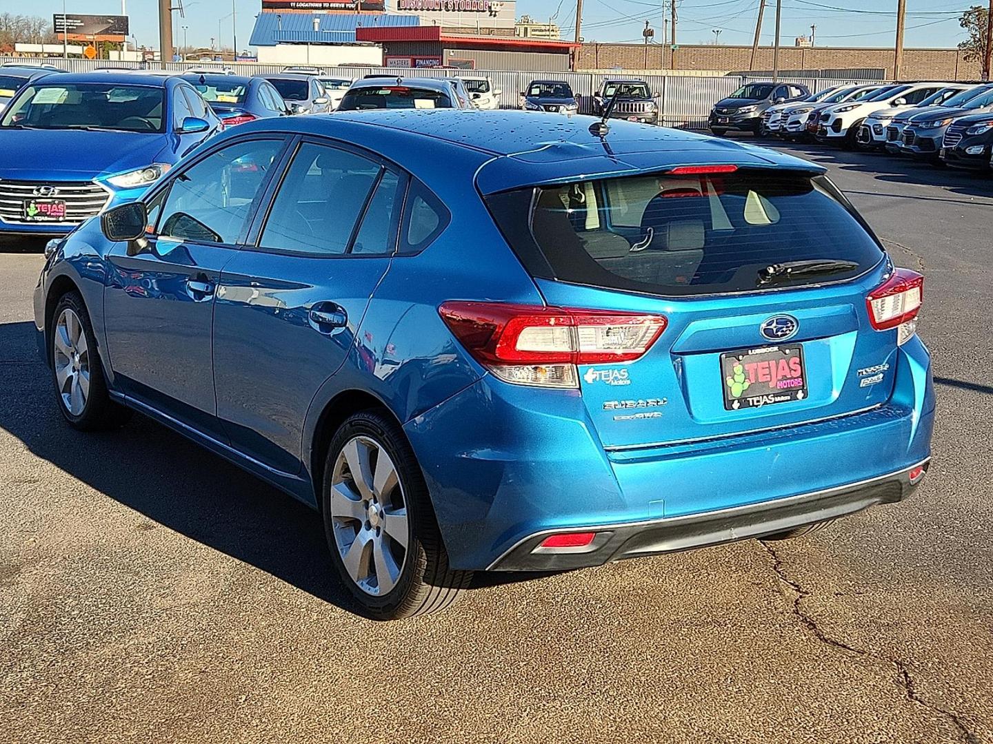 2017 BLUE Subaru Impreza 2.0i (4S3GTAA65H3) with an 2L H-4 gasoline direct injection, DOHC, variable valve control, regular unleaded, engine with 152HP engine, located at 4110 Avenue Q, Lubbock, 79412, 33.556553, -101.855820 - Photo#2