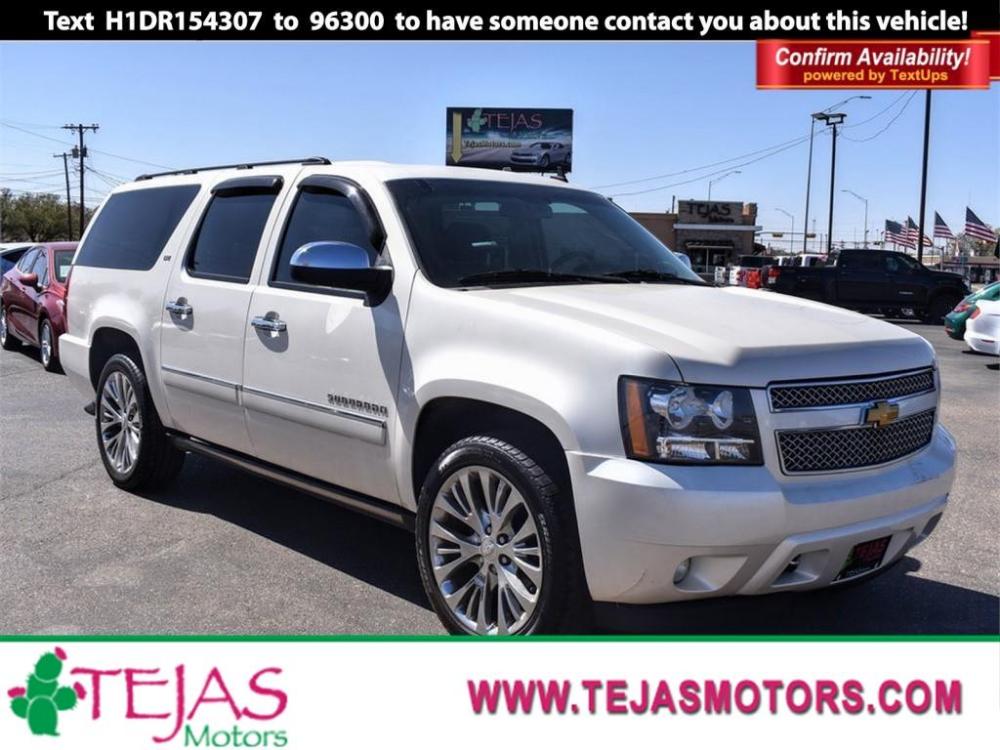 2013 WHITE Chevrolet Suburban (1GNSKKE78DR) with an 5.3L V8 OHV 16V FFV engine, 6-SPEED AUTOMATIC transmission, located at 3701 Avenue Q, Lubbock, 79412, 33.560417, -101.855019 - Photo #0
