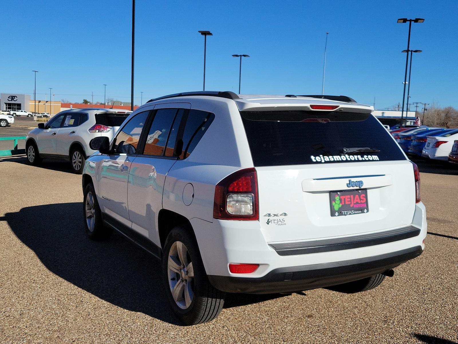 2016 Bright White Clearcoat /Dark Slate Gray Jeep Compass Sport (1C4NJDBB9GD) with an ENGINE: 2.4L I4 DOHC 16V DUAL VVT engine, located at 4110 Avenue Q, Lubbock, 79412, 33.556553, -101.855820 - Photo #1
