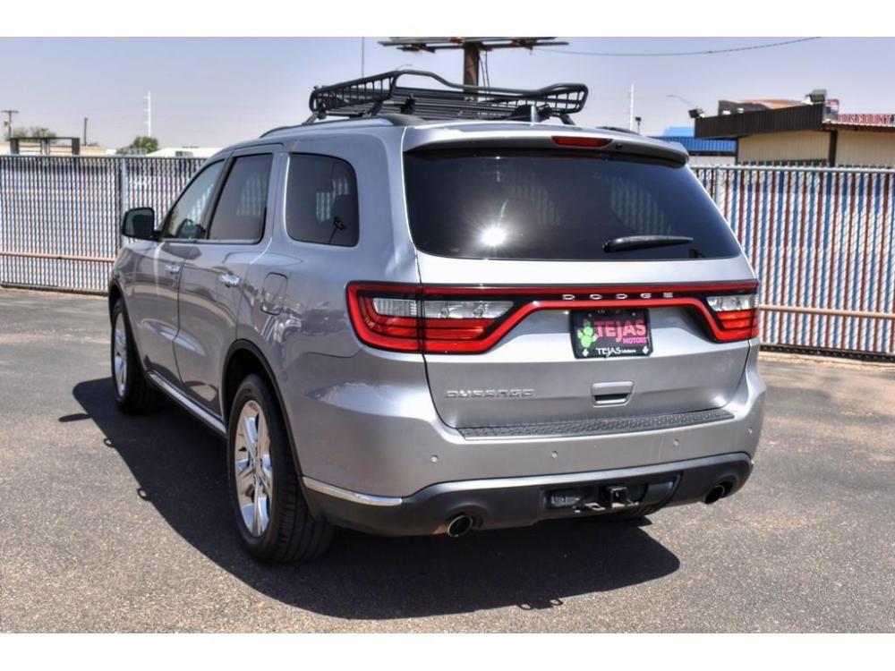 2014 SILVER Dodge Durango (1C4RDHAG9EC) with an 3.6L V6 DOHC 24V engine, 8-SPEED AUTOMATIC transmission, located at 3701 Avenue Q, Lubbock, 79412, 33.560417, -101.855019 - Photo #2