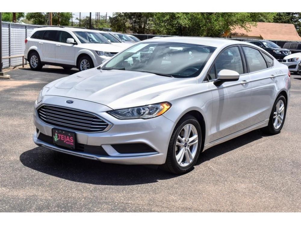 2018 SILVER/BLACK Ford Fusion (3FA6P0HD2JR) with an 1.5L L4 DOHC 16V engine, 6-SPEED AUTOMATIC transmission, located at 3701 Avenue Q, Lubbock, 79412, 33.560417, -101.855019 - Photo #1