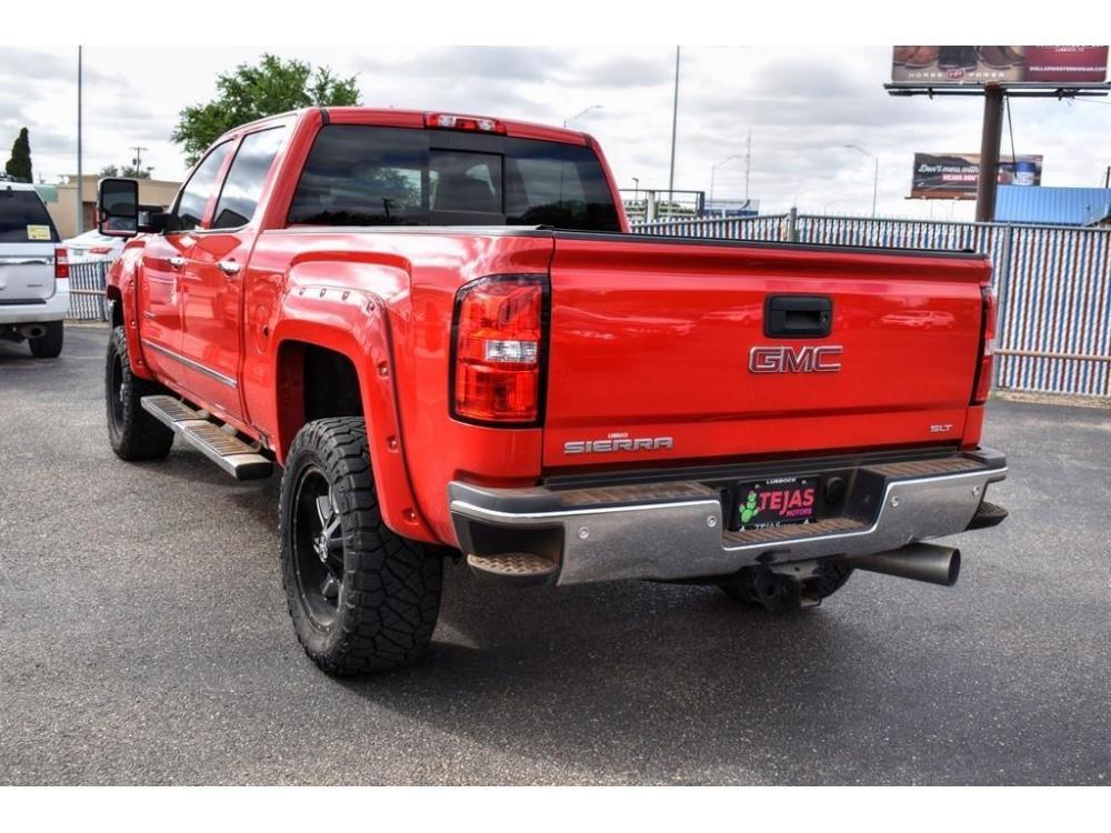 2017 CARDINAL RED /COCOA/DUNE, LEATHER GMC Sierra 2500HD (1GT12TEY4HF) with an 6.6L V8 OHV 16V DIESEL engine, 6-SPEED AUTOMATIC transmission, located at 3701 Avenue Q, Lubbock, 79412, 33.560417, -101.855019 - Photo #2