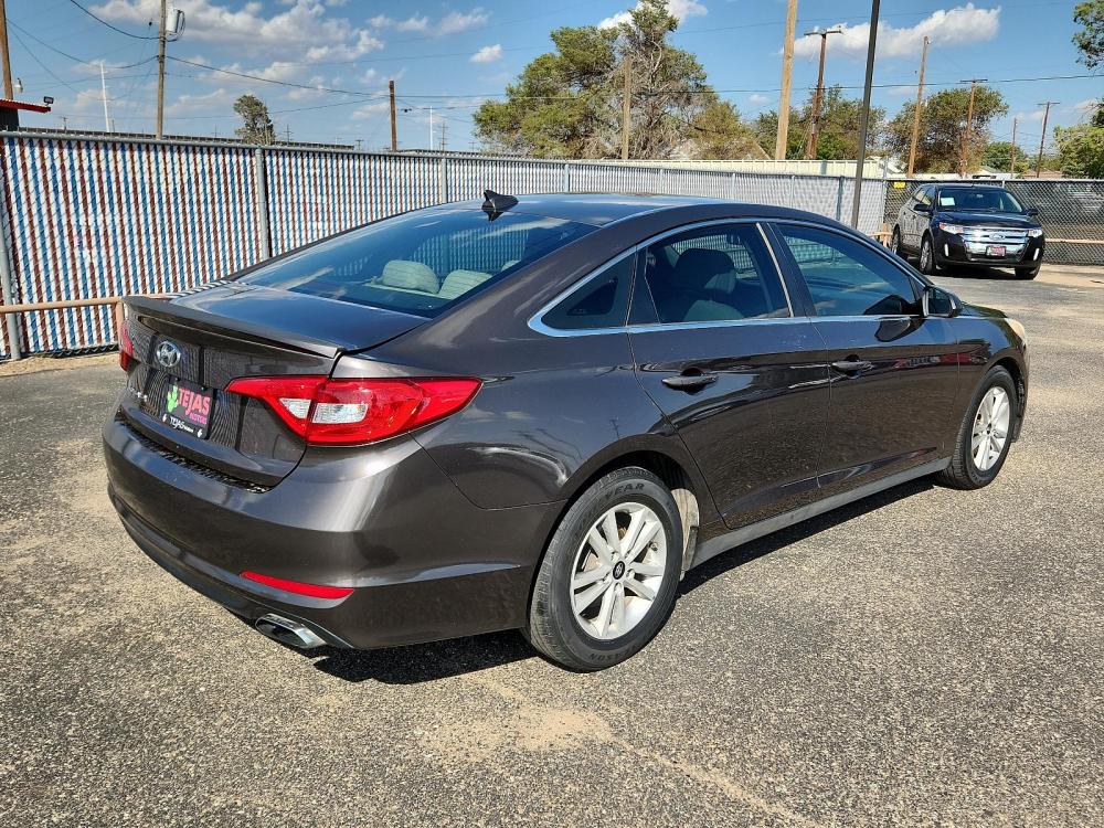 2015 BROWN Hyundai Sonata (5NPE24AF1FH) with an Engine: 2.4L GDI 4-Cylinder engine, 6-SPEED AUTOMATIC W/SHIFTRONIC -INC: OD LOCK-UP TORQUE CONVERTER, SHIFT LOCK AND SHIFTRONIC MANUAL SHIFT MODE transmission, located at 3701 Avenue Q, Lubbock, 79412, 33.560417, -101.855019 - Photo #1