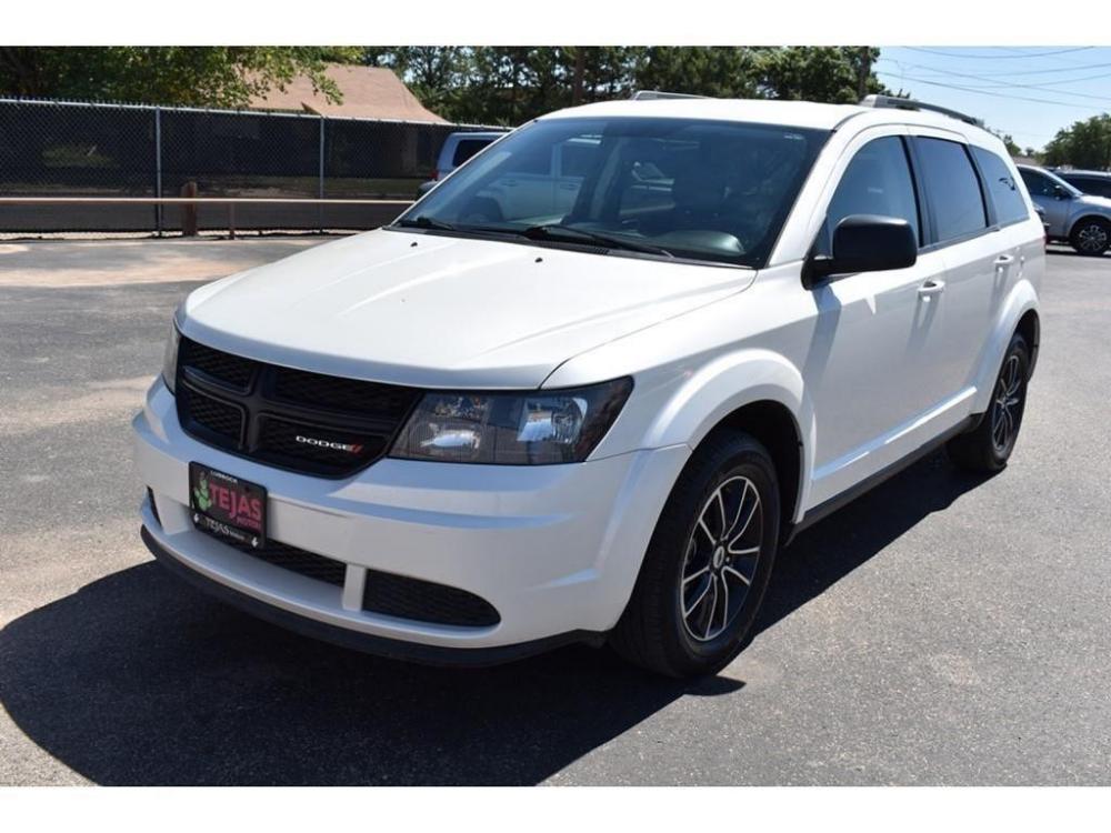 2018 WHITE Dodge Journey (3C4PDCAB7JT) with an 2.4L I4 DOHC 16V Dual VVT engine, 4-SPEED AUTOMATIC VLP transmission, located at 3701 Avenue Q, Lubbock, 79412, 33.560417, -101.855019 - Photo #1