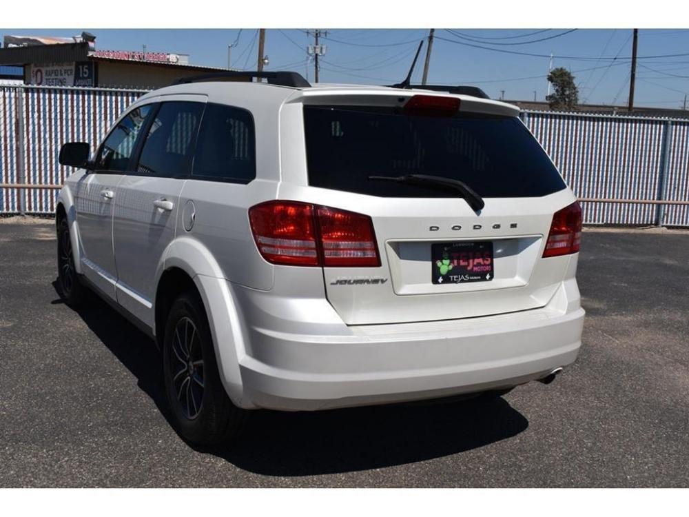 2018 WHITE Dodge Journey (3C4PDCAB7JT) with an 2.4L I4 DOHC 16V Dual VVT engine, 4-SPEED AUTOMATIC VLP transmission, located at 3701 Avenue Q, Lubbock, 79412, 33.560417, -101.855019 - Photo #2