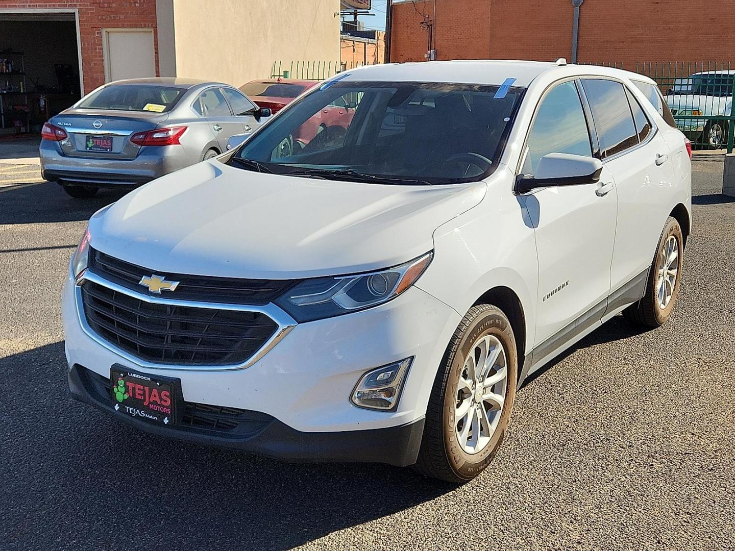 2019 Summit White - GAZ /Jet Black/Cinnamon - HQJ Chevrolet Equinox LT (2GNAXKEV5K6) with an 1.5L I-4 gasoline direct injection, DOHC, VVT variable valve control, intercooled turbo, regular unleaded, engine with 170HP engine, located at 4110 Avenue Q, Lubbock, 79412, 33.556553, -101.855820 - Photo#1