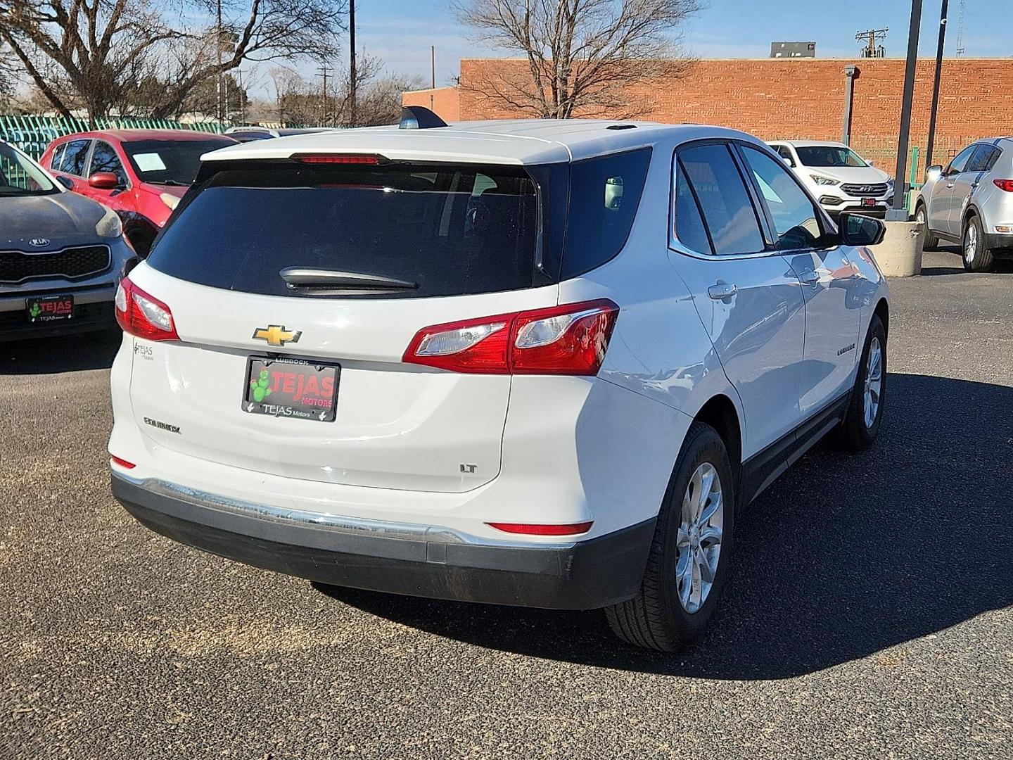 2019 Summit White - GAZ /Jet Black/Cinnamon - HQJ Chevrolet Equinox LT (2GNAXKEV5K6) with an 1.5L I-4 gasoline direct injection, DOHC, VVT variable valve control, intercooled turbo, regular unleaded, engine with 170HP engine, located at 4110 Avenue Q, Lubbock, 79412, 33.556553, -101.855820 - Photo#2