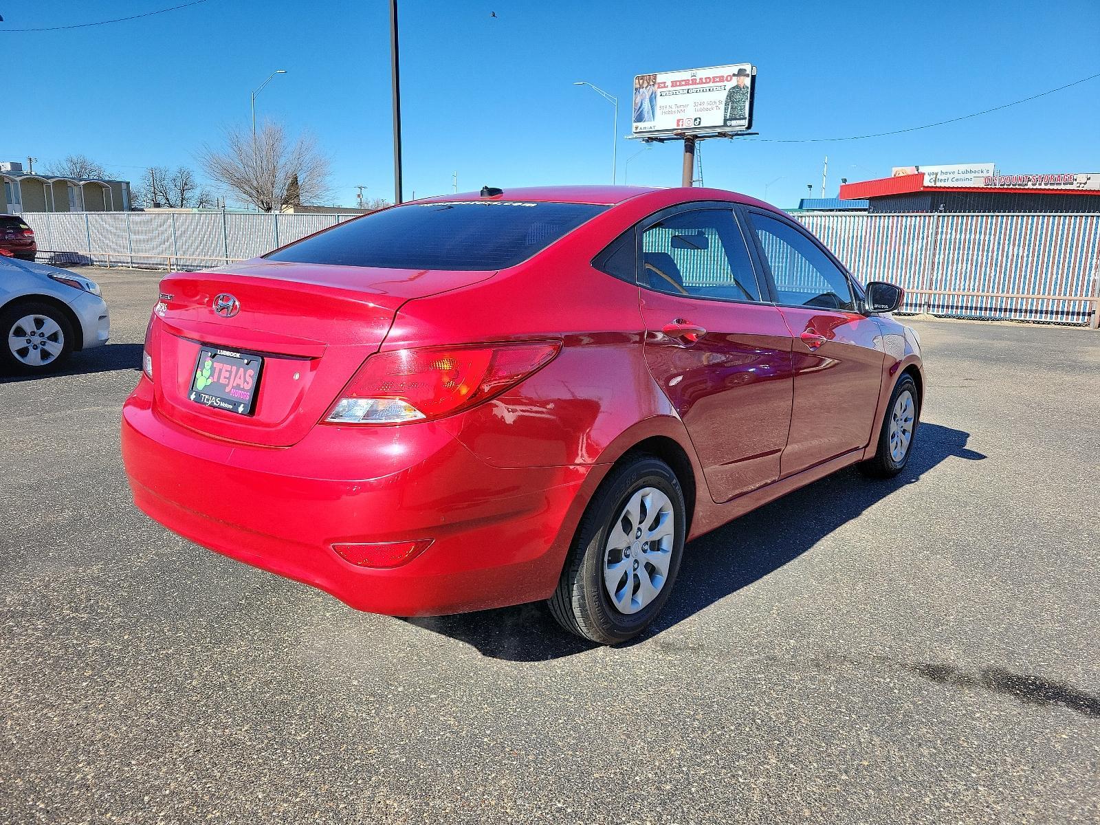 2017 RED Hyundai Accent (KMHCT4AE9HU) with an 1.6L L4 DOHC 16V engine, 6-SPEED AUTOMATIC W/SHIFTRONIC -INC: ACTIVE ECO SYSTEM AND HILLSTART ASSIST CONTROL transmission, located at 3701 Avenue Q, Lubbock, 79412, 33.560417, -101.855019 - Photo #2