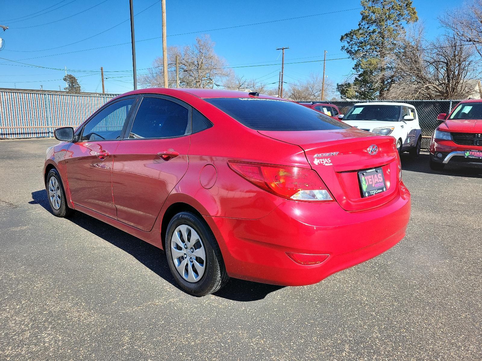 2017 RED Hyundai Accent (KMHCT4AE9HU) with an 1.6L L4 DOHC 16V engine, 6-SPEED AUTOMATIC W/SHIFTRONIC -INC: ACTIVE ECO SYSTEM AND HILLSTART ASSIST CONTROL transmission, located at 3701 Avenue Q, Lubbock, 79412, 33.560417, -101.855019 - Photo #3
