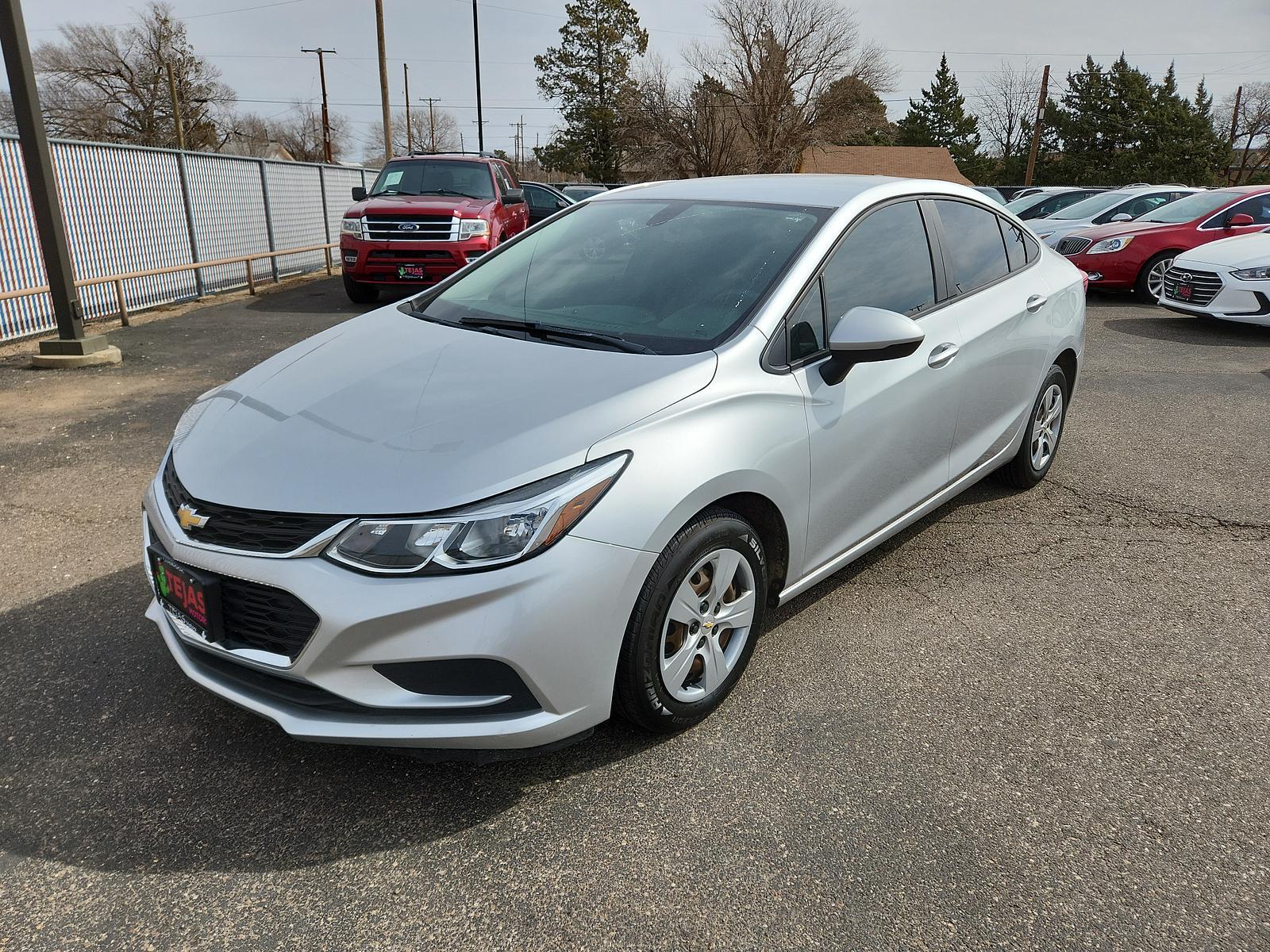 2018 Silver Ice Metallic /Jet Black Chevrolet Cruze LS (1G1BC5SM6J7) with an ENGINE, 1.4L TURBO DOHC 4-CYLINDER DI engine, located at 4110 Avenue Q, Lubbock, 79412, 33.556553, -101.855820 - 02/21/2023 KEY AND INSPECTION IN ENVELOPE GOD - Photo #1
