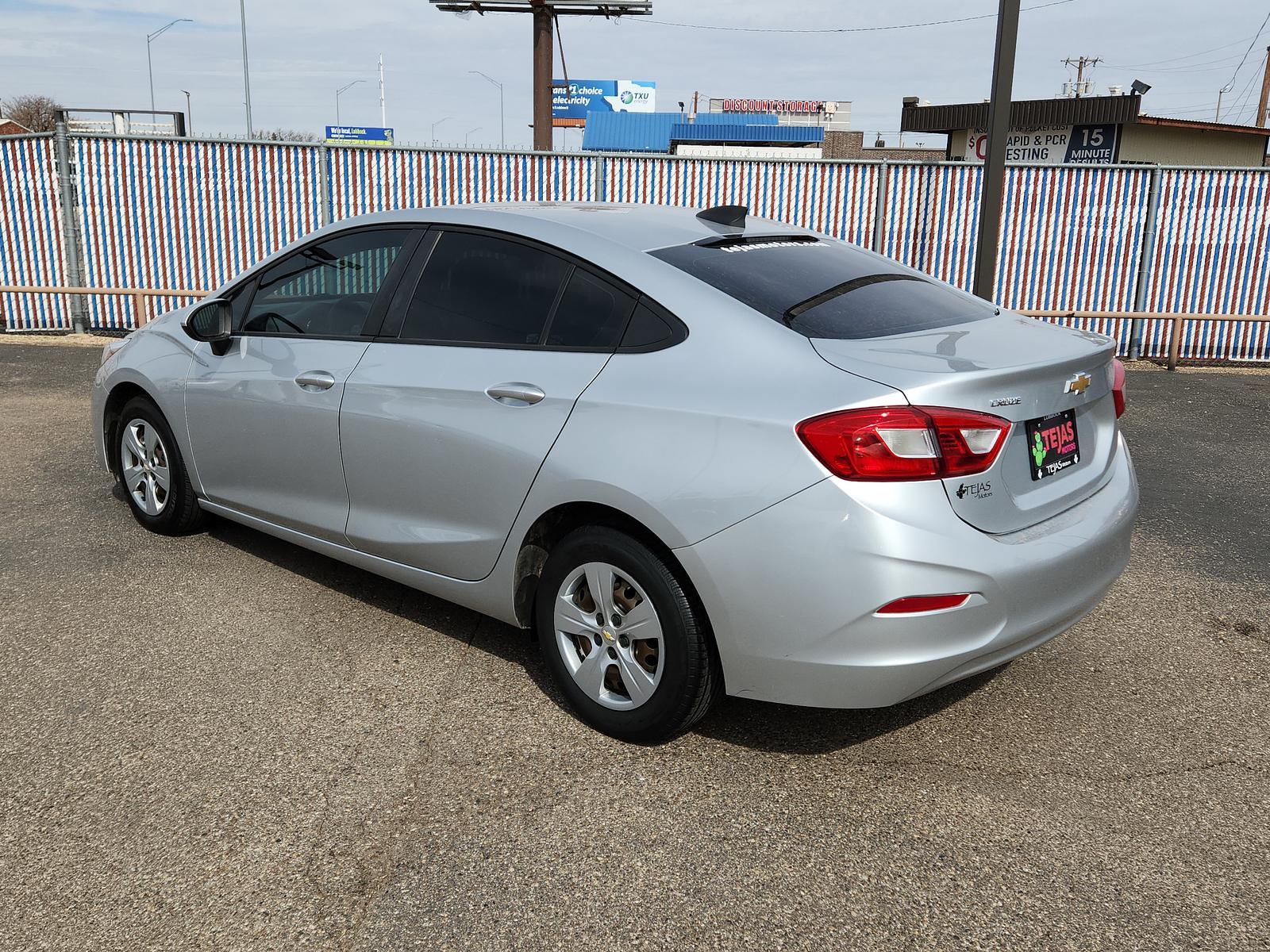 2018 Silver Ice Metallic /Jet Black Chevrolet Cruze LS (1G1BC5SM6J7) with an ENGINE, 1.4L TURBO DOHC 4-CYLINDER DI engine, located at 4110 Avenue Q, Lubbock, 79412, 33.556553, -101.855820 - 02/21/2023 KEY AND INSPECTION IN ENVELOPE GOD - Photo #2