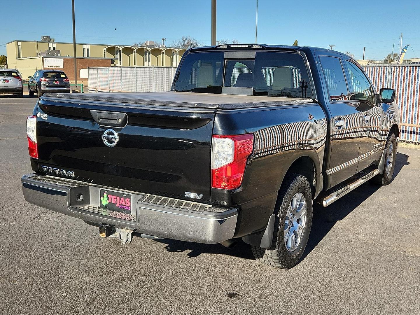2017 Magnetic Black Nissan TITAN SV (1N6AA1EK2HN) with an Endurance 5.6L V-8 gasoline direct injection, VVEL DOHC, variable valve control, regular unleaded, engine with 390HP engine, located at 4110 Avenue Q, Lubbock, 79412, 33.556553, -101.855820 - Photo#1