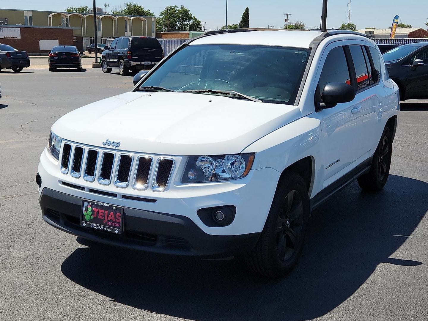 2017 WHITE Jeep Compass Sport 4x4 (1C4NJDBBXHD) with an 2.4L I-4 DOHC, variable valve control, regular unleaded, engine with 172HP engine, located at 4110 Avenue Q, Lubbock, 79412, 33.556553, -101.855820 - Photo#3