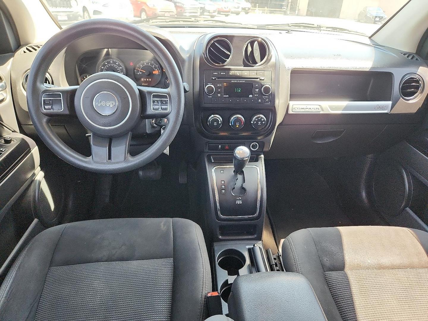 2017 WHITE Jeep Compass Sport 4x4 (1C4NJDBBXHD) with an 2.4L I-4 DOHC, variable valve control, regular unleaded, engine with 172HP engine, located at 4110 Avenue Q, Lubbock, 79412, 33.556553, -101.855820 - Photo#5