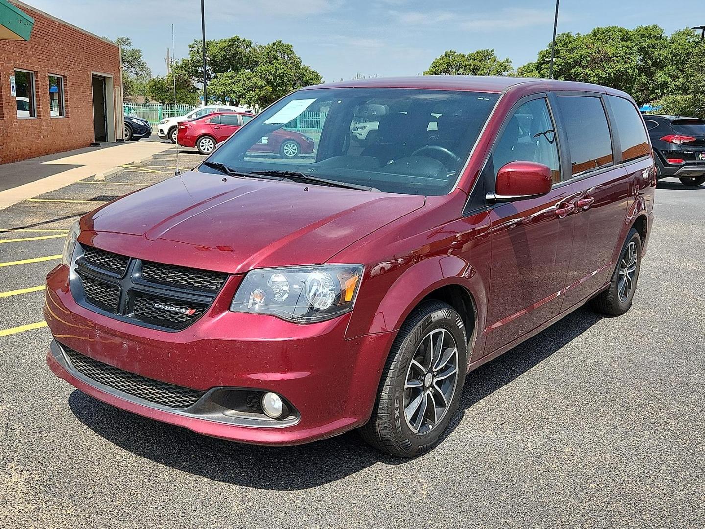 2018 Octane Red Pearlcoat - PRV /Black - X9 Dodge Grand Caravan SE Plus (2C4RDGBG0JR) with an Pentastar 3.6L V-6 DOHC, VVT variable valve control, regular unleaded, engine with 283HP engine, located at 4110 Avenue Q, Lubbock, 79412, 33.556553, -101.855820 - Photo#4