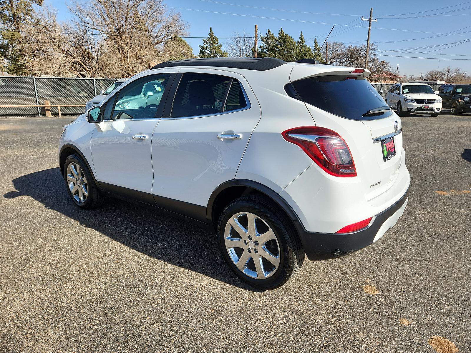 2017 Summit White /Ebony Buick Encore Essence (KL4CJGSB8HB) with an ENGINE, ECOTEC TURBO 1.4L VARIABLE VALVE TIMING DOHC 4-CYLINDER SEQUENTIAL MFI engine, located at 4110 Avenue Q, Lubbock, 79412, 33.556553, -101.855820 - 003/01/2023 KEY IN ENVELOPE GOD - Photo #2