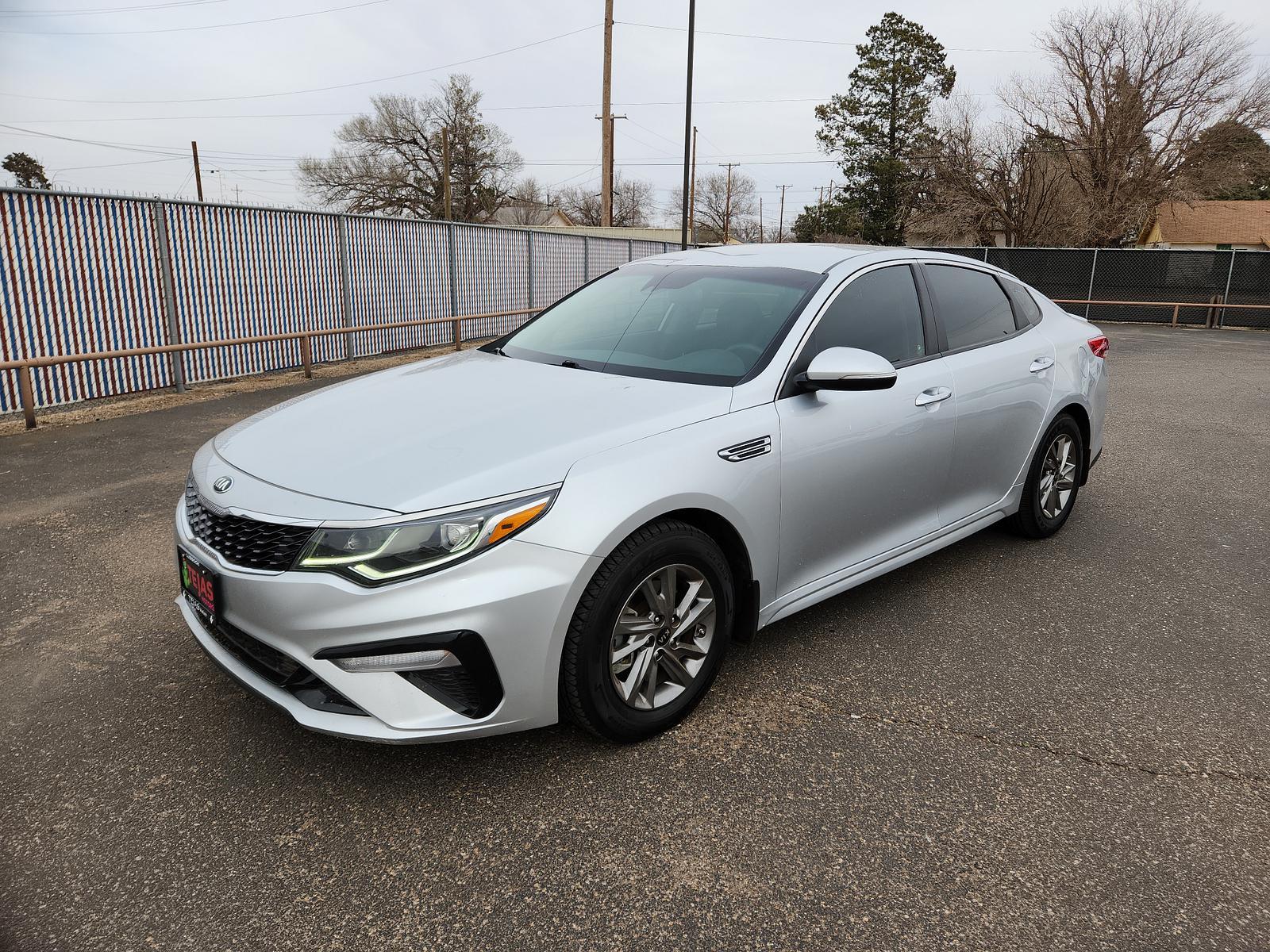 2019 Sparkling Silver /Black Kia Optima LX (5XXGT4L36KG) with an Engine: 2.4L DOHC I4 GDI engine, located at 4110 Avenue Q, Lubbock, 79412, 33.556553, -101.855820 - 03/01/2023 KEY IN ENVELOPE GOD - Photo #1