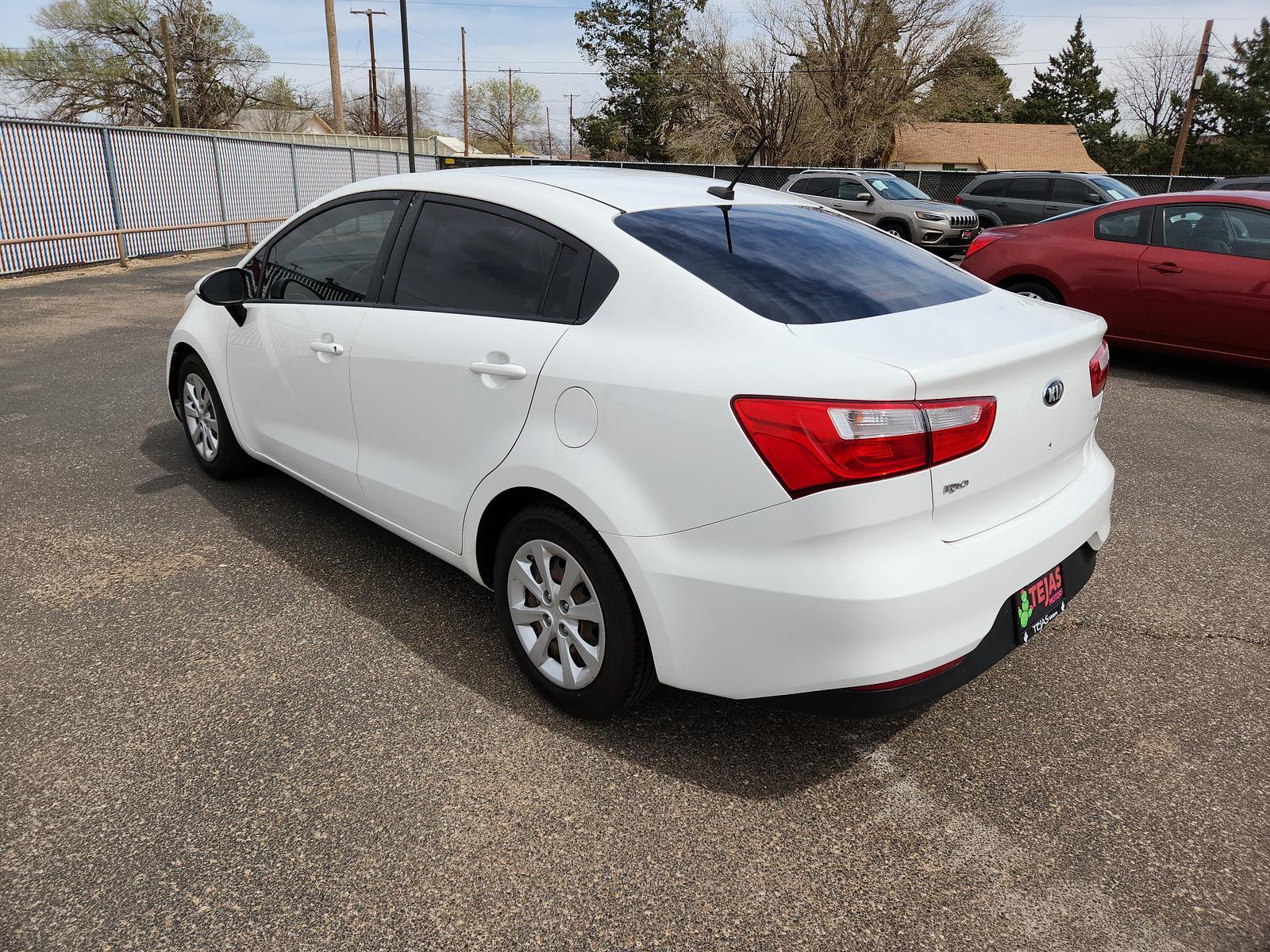 2016 Clear White /Black Kia Rio LX (KNADM4A34G6) with an Engine: 1.6L GDI 16-Valve 4-Cylinder -inc: aluminum block engine, located at 4110 Avenue Q, Lubbock, 79412, 33.556553, -101.855820 - 03/17/2023 KEY SND INSPECTION IN ENVELOPE GOD - Photo #2
