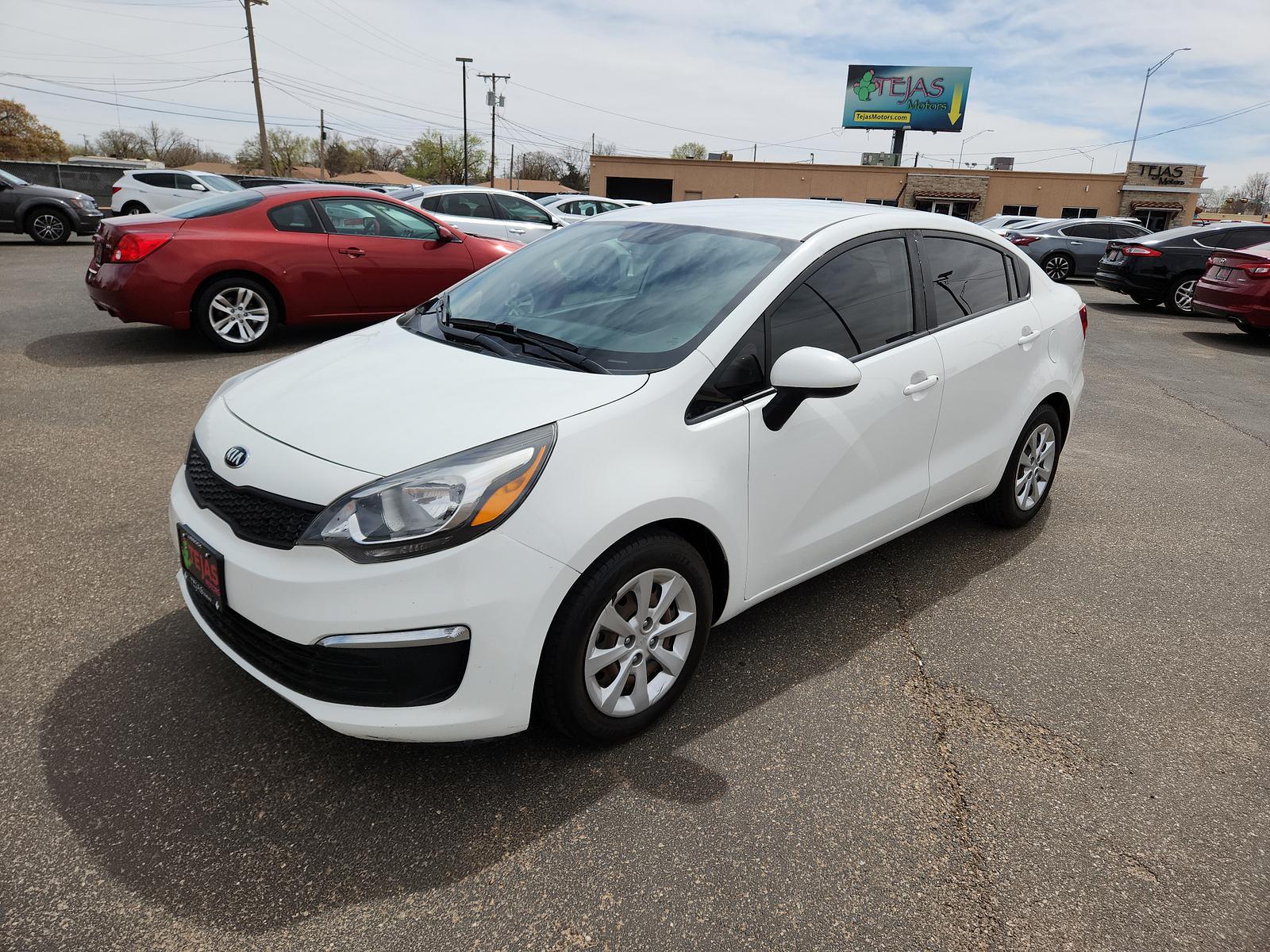 2016 Clear White /Black Kia Rio LX (KNADM4A34G6) with an Engine: 1.6L GDI 16-Valve 4-Cylinder -inc: aluminum block engine, located at 4110 Avenue Q, Lubbock, 79412, 33.556553, -101.855820 - 03/17/2023 KEY SND INSPECTION IN ENVELOPE GOD - Photo #3