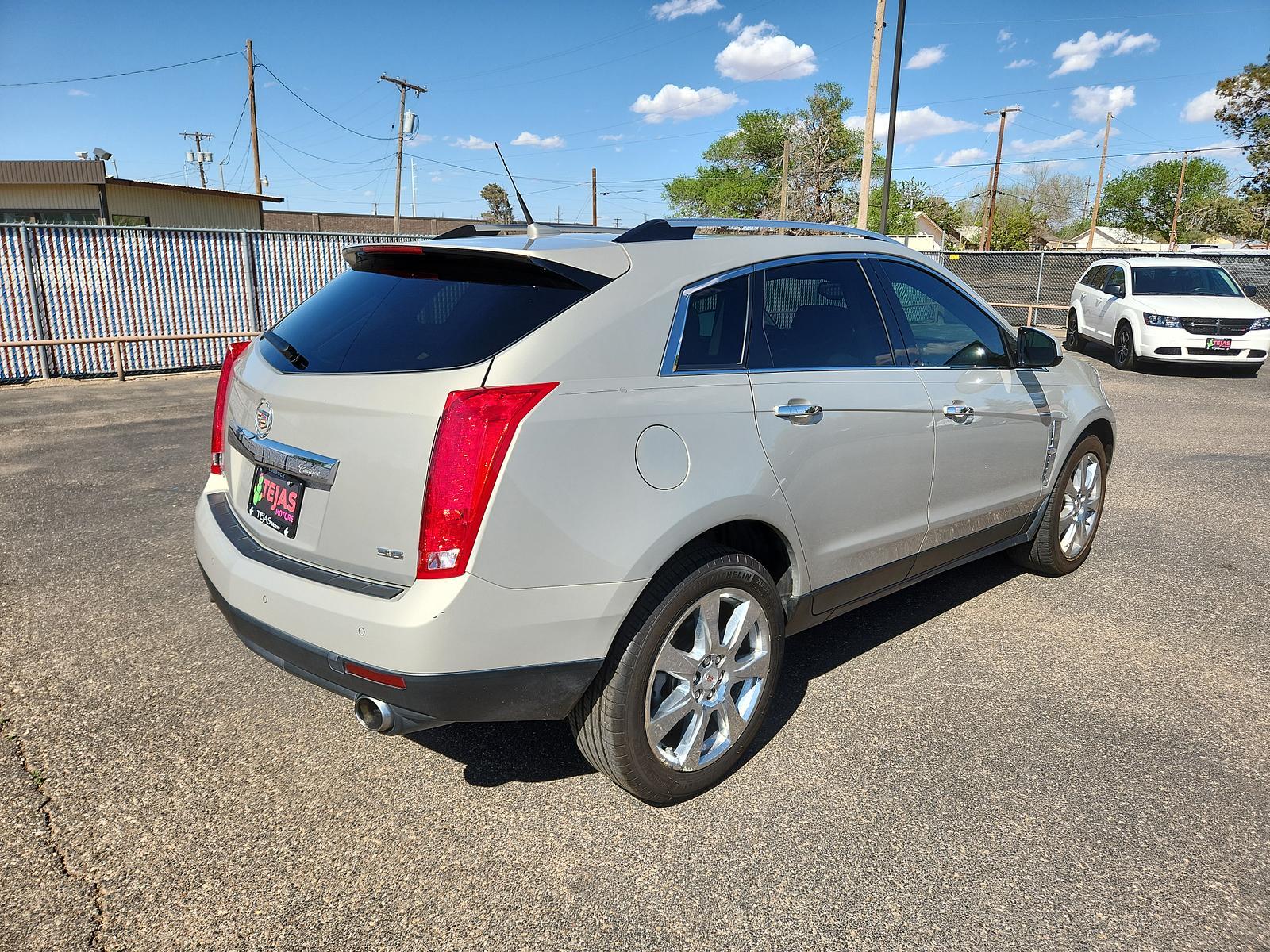 2012 Gold Mist Metallic /Shale w/Brownstone accents Cadillac SRX Performance Collection (3GYFNBE37CS) with an ENGINE, 3.6L SIDI DOHC V6 VVT WITH E85 FLEXFUEL (GAS ETHANOL) CAPABILITY engine, located at 4110 Avenue Q, Lubbock, 79412, 33.556553, -101.855820 - 03/24/2023 KEY IN ENVELOPE GOD - Photo #1