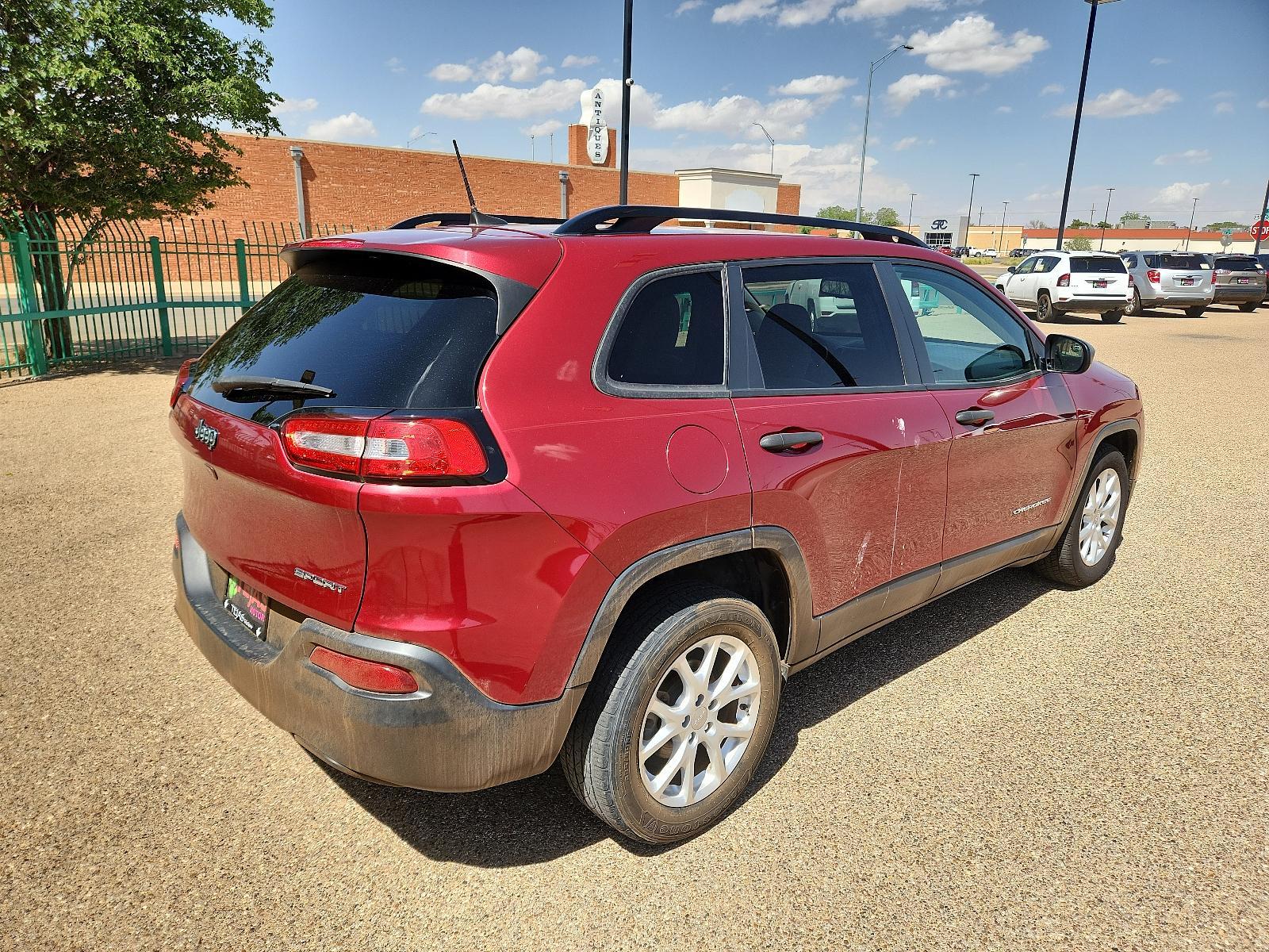 2016 Deep Cherry Red Crystal Pearlcoat /Lt Frost Beige/Black Jeep Cherokee Sport (1C4PJLAB4GW) with an 2.4L L4 DOHC 16V engine, located at 4110 Avenue Q, Lubbock, 79412, 33.556553, -101.855820 - 04/01/2023 INSPECTION IN ENVELOPE 04/06/2023 KEY IN ENVELOPE GOD - Photo #1
