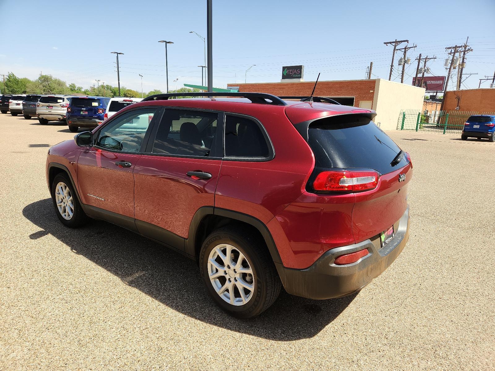 2016 Deep Cherry Red Crystal Pearlcoat /Lt Frost Beige/Black Jeep Cherokee Sport (1C4PJLAB4GW) with an 2.4L L4 DOHC 16V engine, located at 4110 Avenue Q, Lubbock, 79412, 33.556553, -101.855820 - 04/01/2023 INSPECTION IN ENVELOPE 04/06/2023 KEY IN ENVELOPE GOD - Photo #2