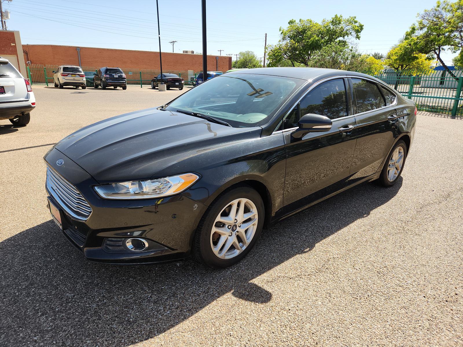 2015 BLACK Ford Fusion SE (3FA6P0HD3FR) with an ENGINE: 1.5L ECOBOOST engine, located at 4110 Avenue Q, Lubbock, 79412, 33.556553, -101.855820 - 04/12/2023 KEY AND INSPECTION IN ENVELOPE GOD - Photo #1