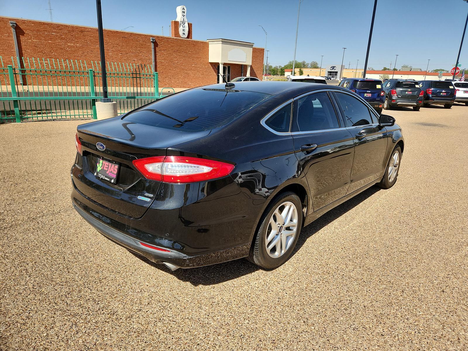 2015 BLACK Ford Fusion SE (3FA6P0HD3FR) with an ENGINE: 1.5L ECOBOOST engine, located at 4110 Avenue Q, Lubbock, 79412, 33.556553, -101.855820 - 04/12/2023 KEY AND INSPECTION IN ENVELOPE GOD - Photo #2