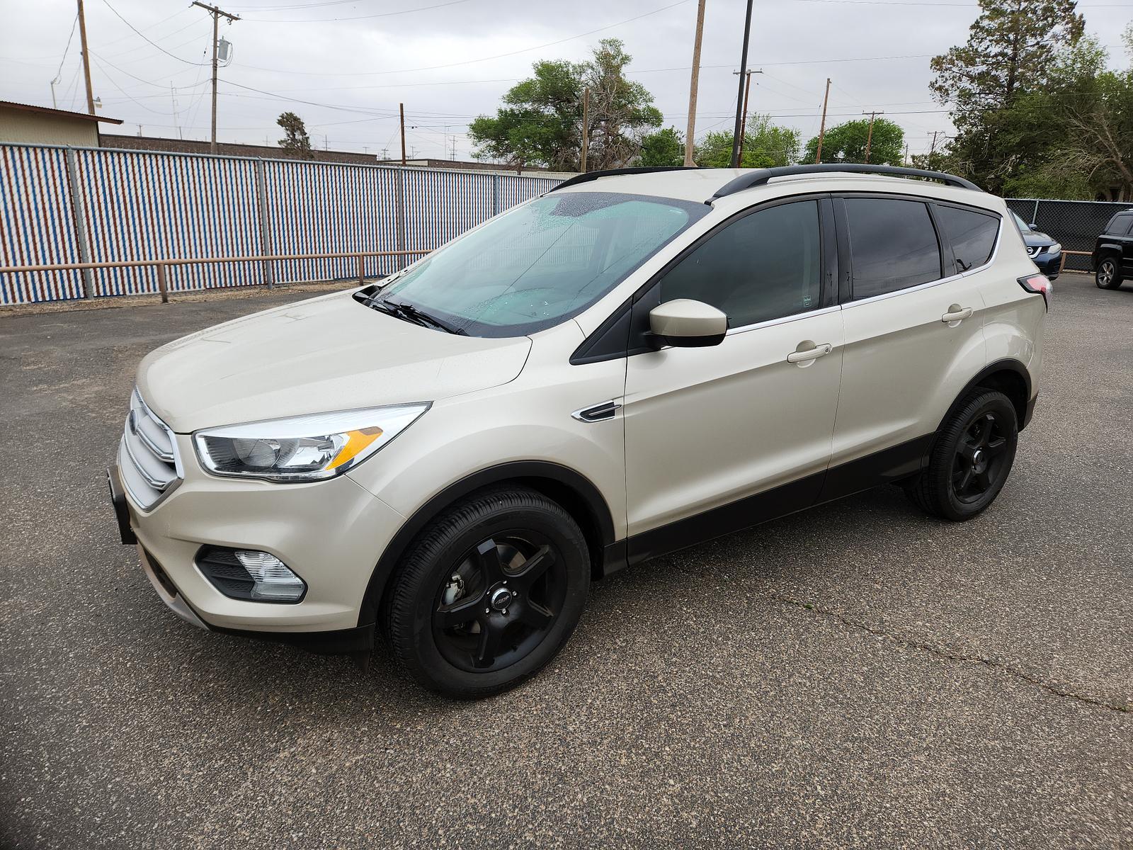 2018 TAN Ford Escape SE (1FMCU0GD8JU) with an ENGINE: 1.5L ECOBOOST engine, located at 4110 Avenue Q, Lubbock, 79412, 33.556553, -101.855820 - 04/13/2023 KEY IN ENVELOPE GOD - Photo #1
