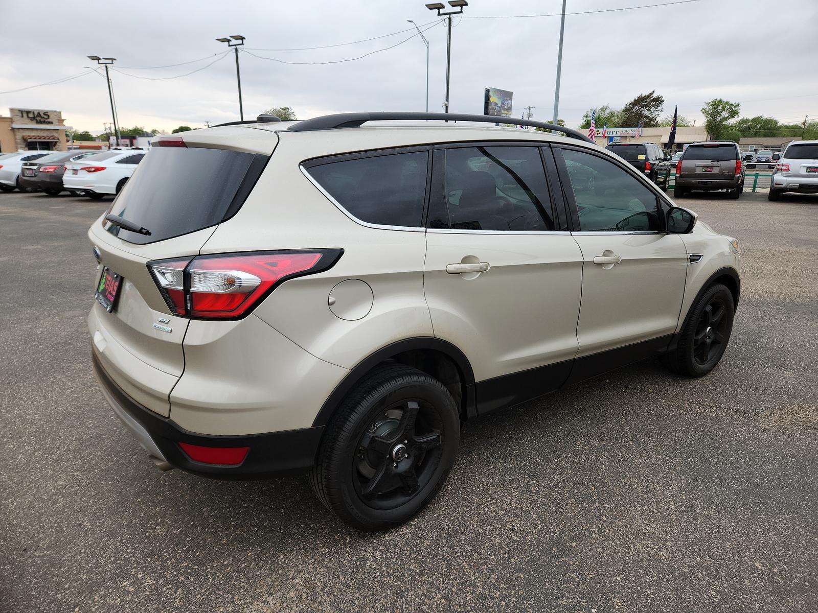2018 TAN Ford Escape SE (1FMCU0GD8JU) with an ENGINE: 1.5L ECOBOOST engine, located at 4110 Avenue Q, Lubbock, 79412, 33.556553, -101.855820 - 04/13/2023 KEY IN ENVELOPE GOD - Photo #3