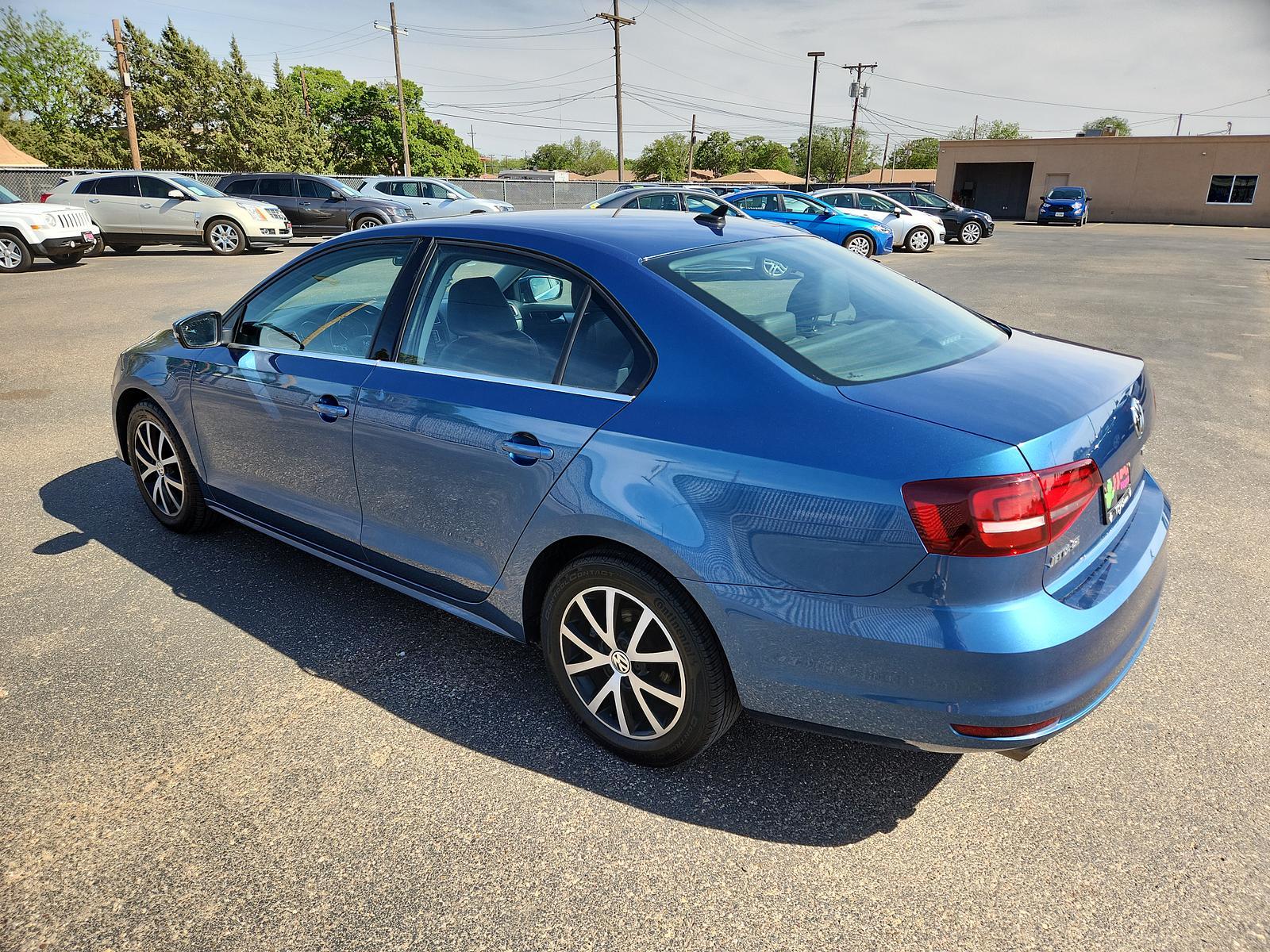 2017 BLUE Volkswagen Jetta 1.4T SE (3VWDB7AJ2HM) with an Engine: 1.4L TSI I-4 Turbocharged -inc: DOHC 16-valve, direct injection engine, located at 4110 Avenue Q, Lubbock, 79412, 33.556553, -101.855820 - Photo #2