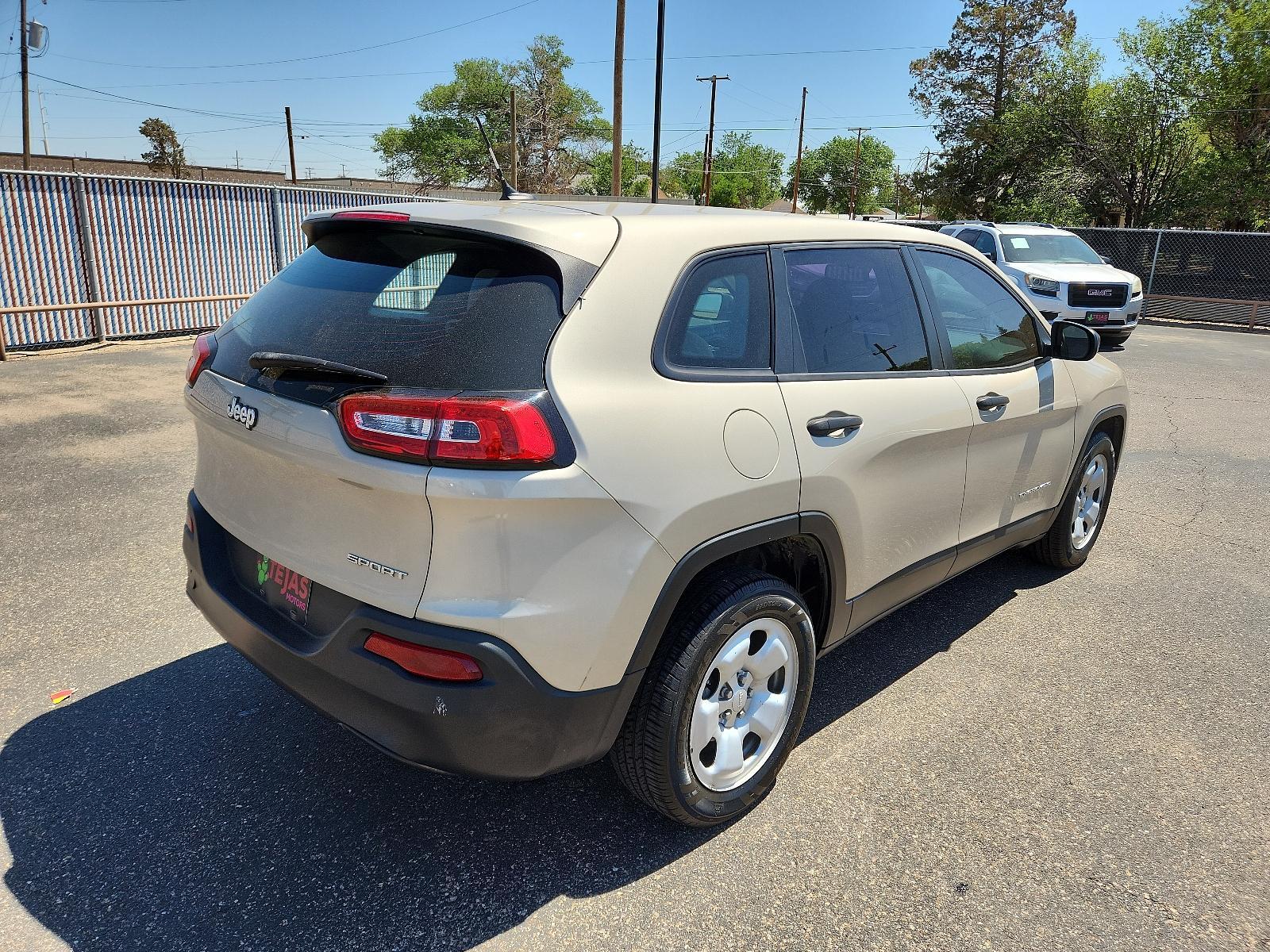 2015 GOLD Jeep Cherokee Sport (1C4PJLAB8FW) with an ENGINE: 2.4L I4 MULTIAIR engine, located at 4110 Avenue Q, Lubbock, 79412, 33.556553, -101.855820 - 05/06/2023 INSPECTION IN ENVELOPE GOD 05/10/2023 KEY IN ENVELOPE GOD - Photo #1