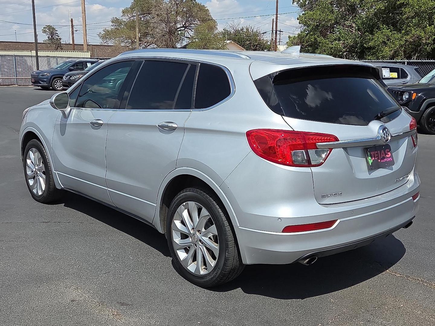 2016 Ebony Twilight Metallic - GB8 /Light Neutral/Ebony Accents - H36 Buick Envision Premium II (LRBFXFSX1GD) with an ECOTEC 2L I-4 gasoline direct injection, DOHC, variable valve control, intercooled turbo, premium unleaded, engine with 252HP engine, located at 4110 Avenue Q, Lubbock, 79412, 33.556553, -101.855820 - Photo#3