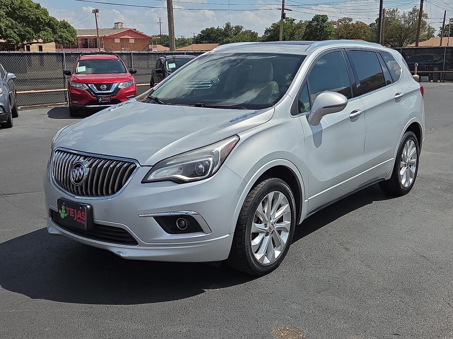 2016 Ebony Twilight Metallic - GB8 /Light Neutral/Ebony Accents - H36 Buick Envision Premium II (LRBFXFSX1GD) with an ECOTEC 2L I-4 gasoline direct injection, DOHC, variable valve control, intercooled turbo, premium unleaded, engine with 252HP engine, located at 4110 Avenue Q, Lubbock, 79412, 33.556553, -101.855820 - Photo#4