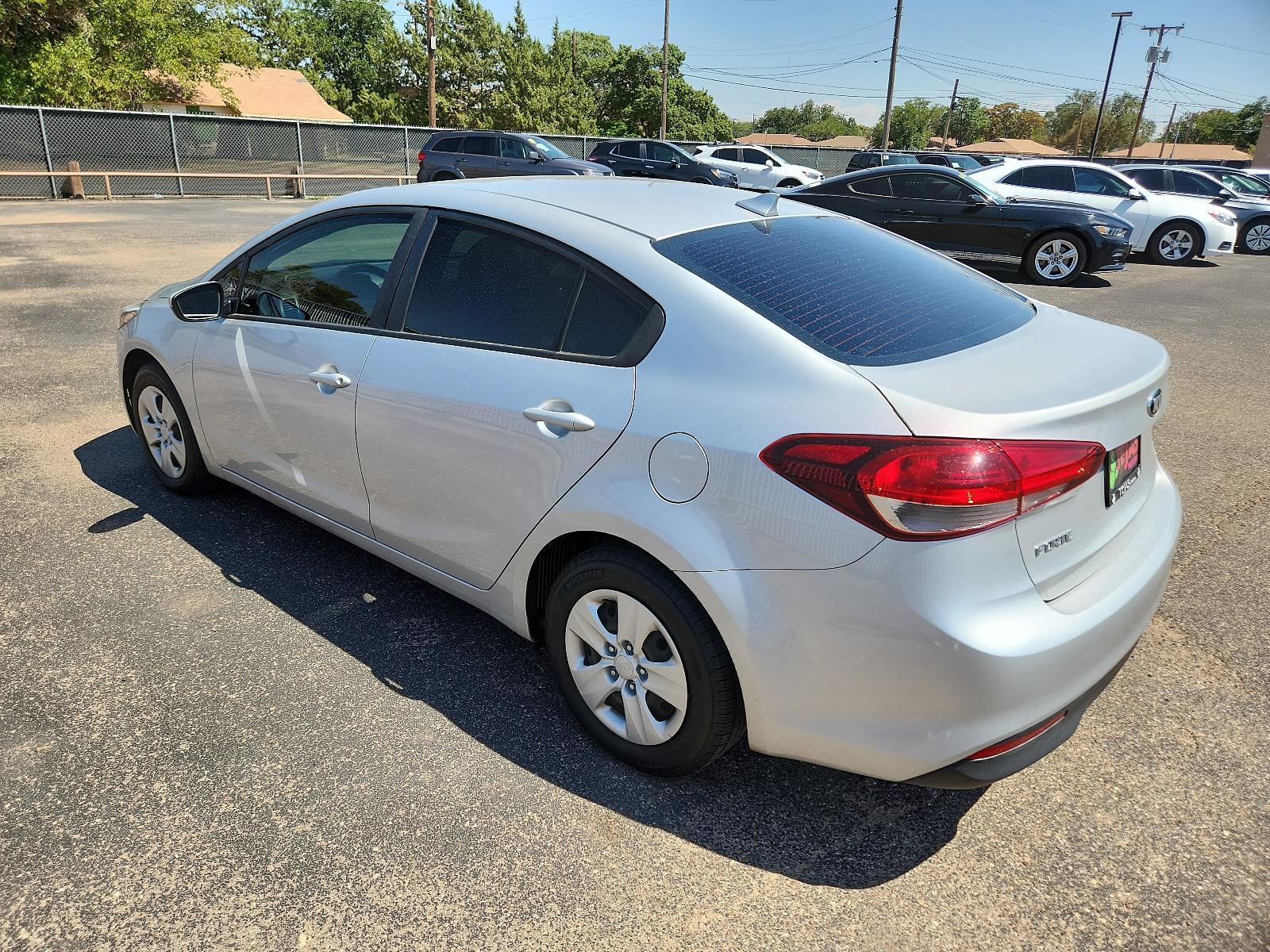 2018 SILVER Kia Forte LX (3KPFK4A75JE) with an Engine: 2.0L I4 DOHC D-CVVT MPI engine, located at 4110 Avenue Q, Lubbock, 79412, 33.556553, -101.855820 - 08/04/2023 INSPECTION IN ENVELOPE GOD 08/05/2023 KEY IN ENVELOPE GOD 08/12/2023 KEY IN ENVELOPE GOD - Photo #2
