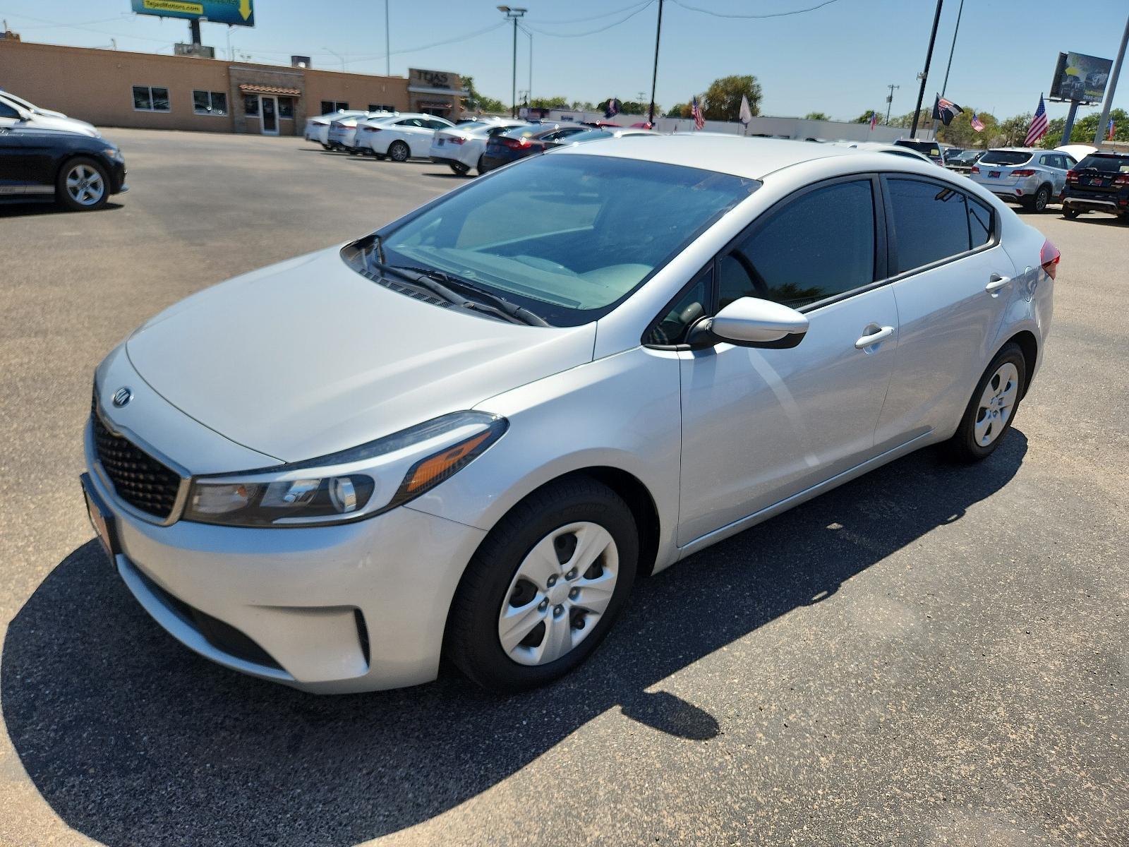 2018 SILVER Kia Forte LX (3KPFK4A75JE) with an Engine: 2.0L I4 DOHC D-CVVT MPI engine, located at 4110 Avenue Q, Lubbock, 79412, 33.556553, -101.855820 - 08/04/2023 INSPECTION IN ENVELOPE GOD 08/05/2023 KEY IN ENVELOPE GOD 08/12/2023 KEY IN ENVELOPE GOD - Photo #3